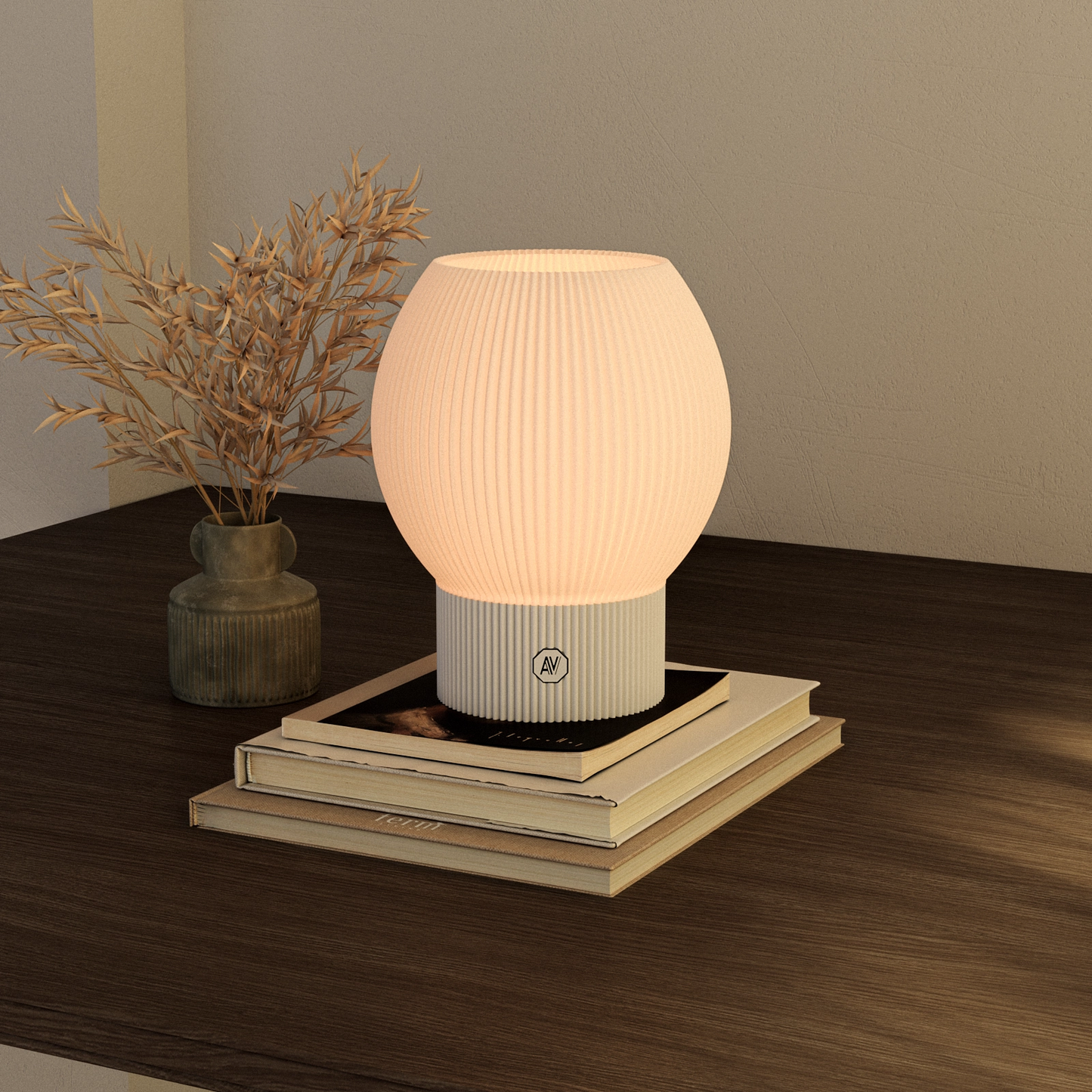 Lampe décorative Linea M posée sur des livres – éclairage design intérieur